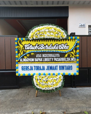 Papan Bunga Duka di Afe Taduma